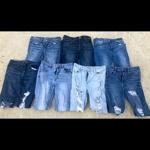 7 pairs of American Eagle size 10L Skinny Jeans.